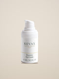 REVAX Recovery Eye Cream 15 ml pump bottle on a warm cream background, front view