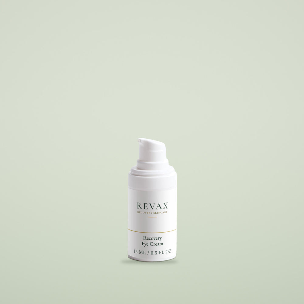REVAX Recovery Eye Cream 15 ml, white pump bottle on a soft sage background, front view